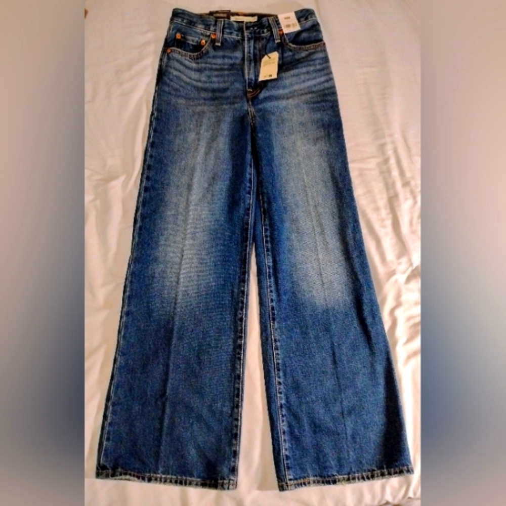 Levi rib cage wide leg , waste 25, length 30, dark denim
